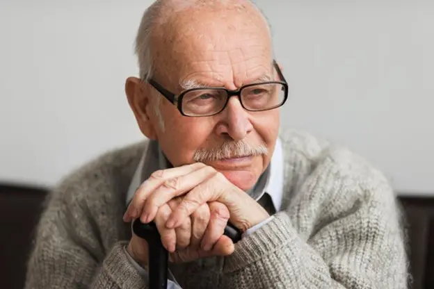 an elderly man practicing the Buteyko Method