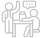 Two people sitting at a table talking