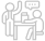 Two people sitting at a table talking
